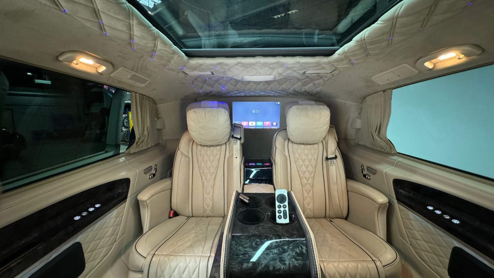 Luxury chauffeur van interior with premium seating