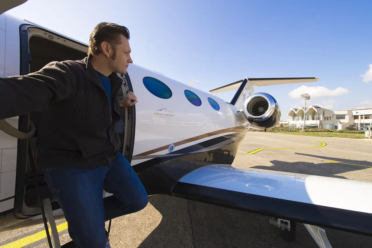 Private jet on airport runway for executive travel